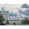 Foto vom 12. September 2012: Wolken über Sporthalle und Hochhaus